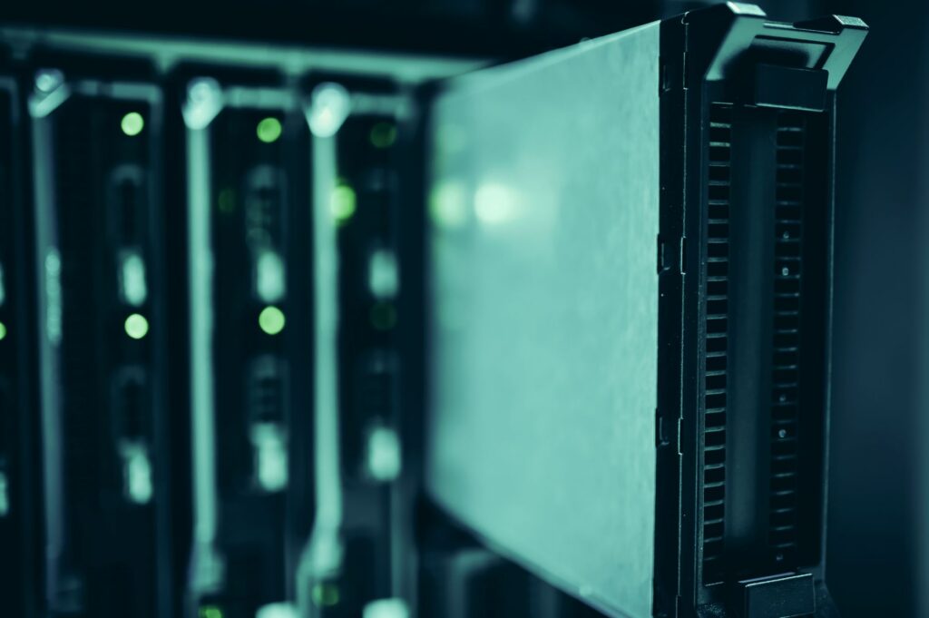 Server racks in a data center, representing the AI infrastructure behind the Nvidia Hugging Face acquisition